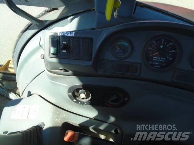 New Holland 575 E Retrocargadoras