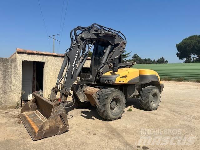 Mecalac 12 MTX Excavadoras de ruedas