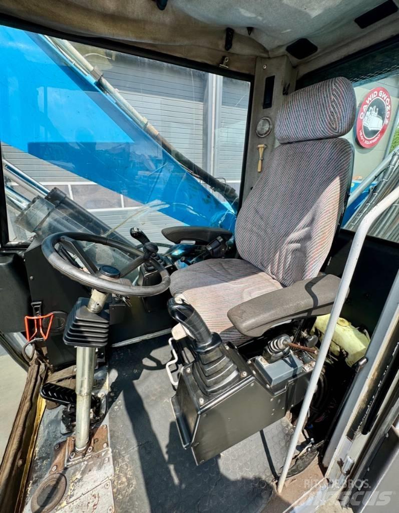 Fuchs MHL 331 Excavadoras de manutención