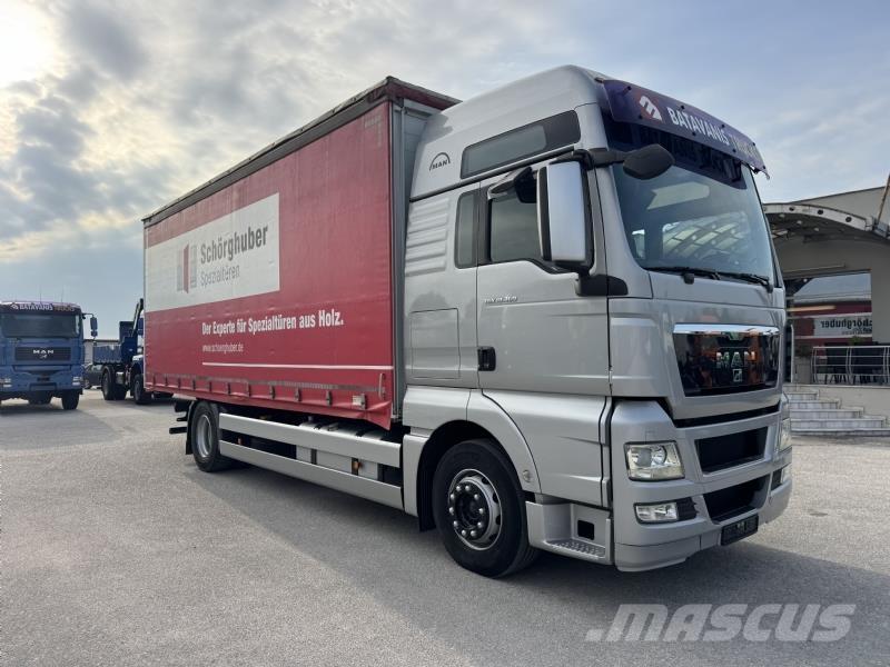 MAN TGX 18.360 ADR Camión con caja abierta