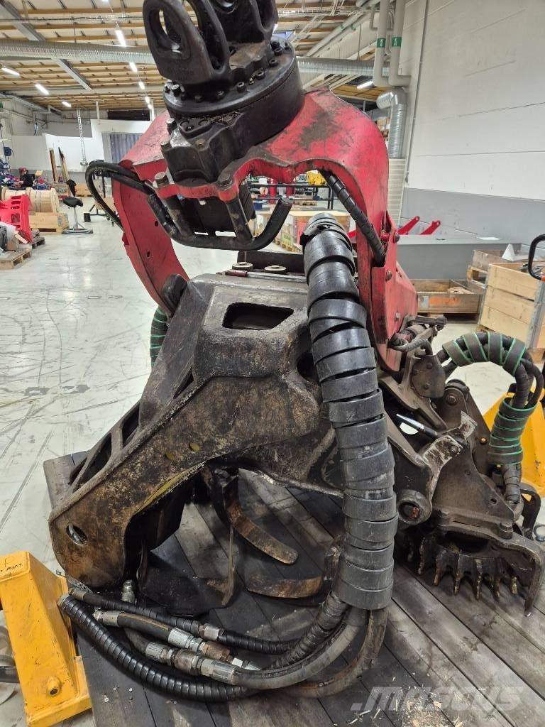 Komatsu C 144 Cabezales cortadores