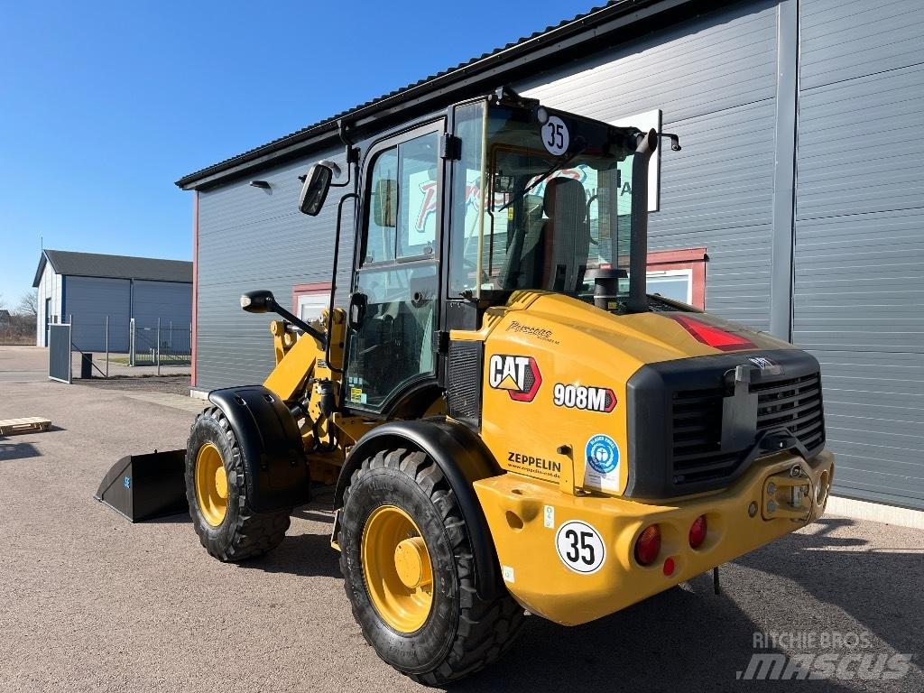 CAT 908M-22 1670Tim Cargadoras sobre ruedas