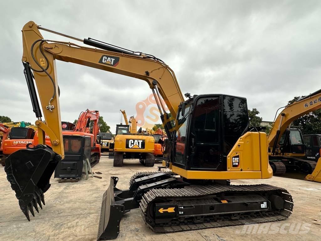 CAT 310 Excavadoras de cadenas