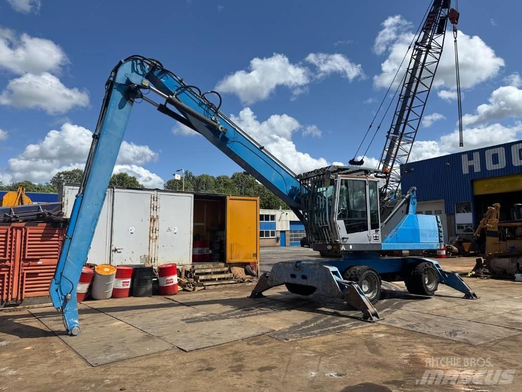 Fuchs MHL 335 Excavadoras de manutención