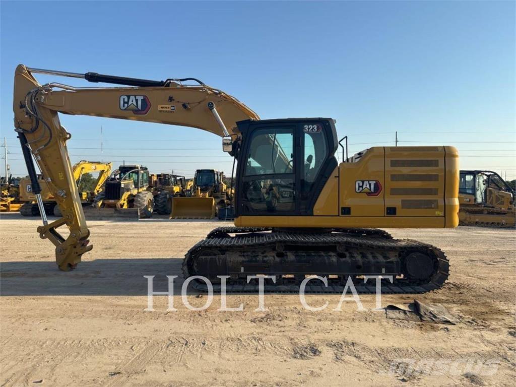 CAT 323 TC Cargadoras sobre ruedas