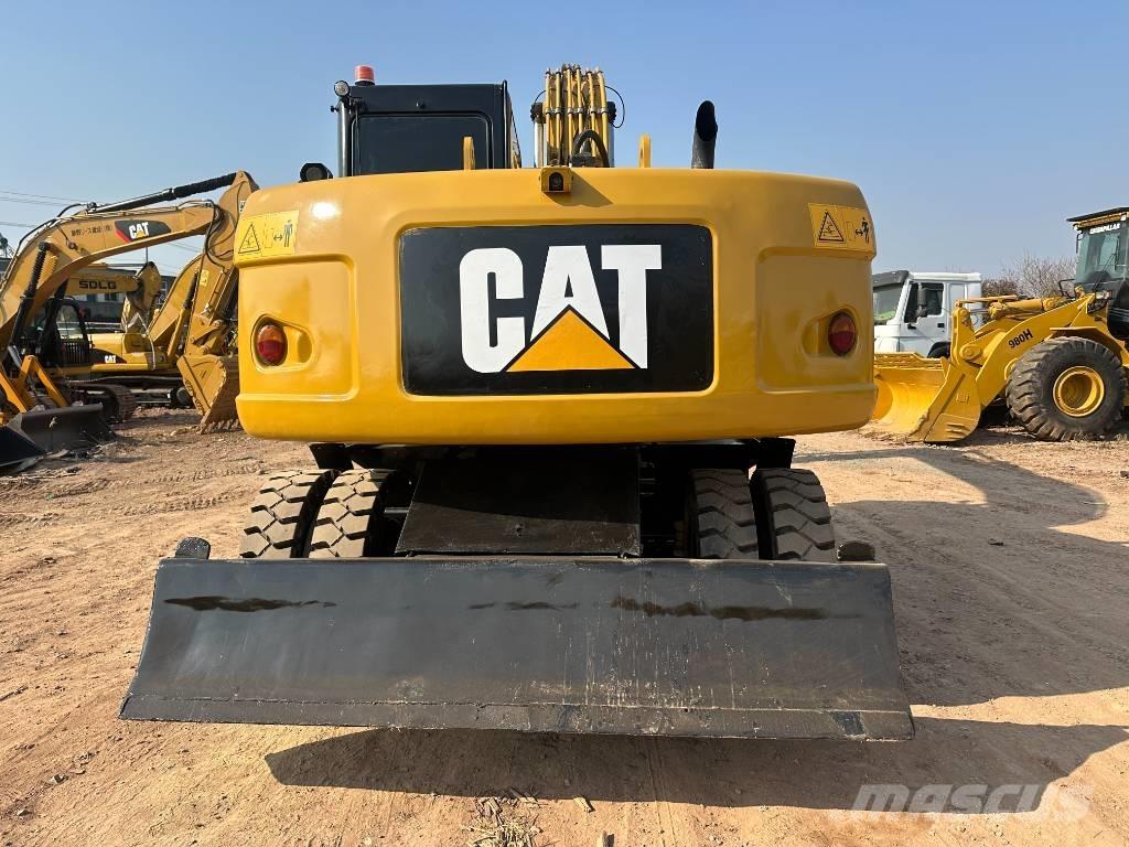 CAT M 320D Excavadoras de ruedas