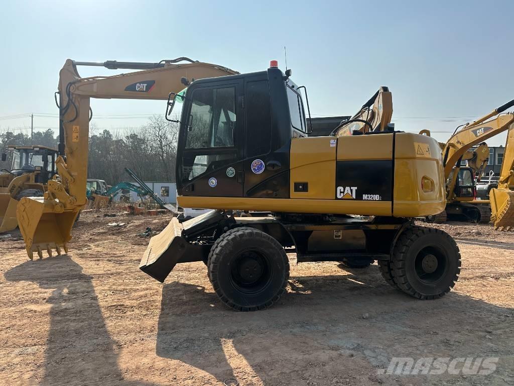 CAT M 320D Excavadoras de ruedas