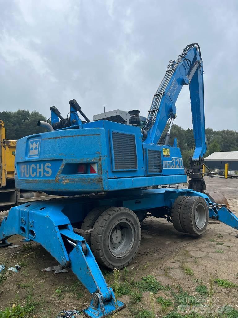 Fuchs MHL 320 Excavadoras de ruedas