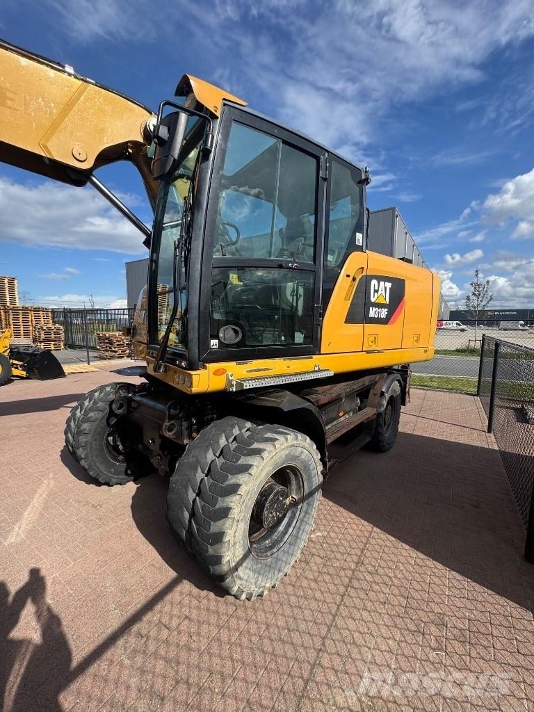 CAT 318 Excavadoras de ruedas