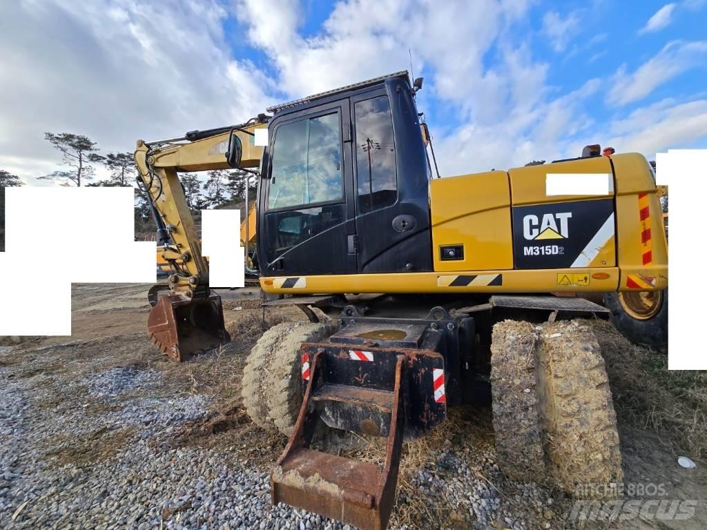 CAT M 315 D Excavadoras de ruedas