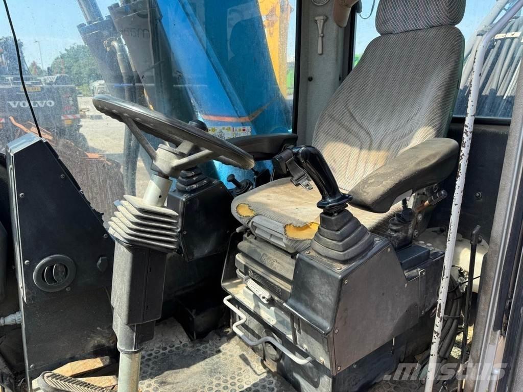 Fuchs MHL 320 Excavadoras de manutención