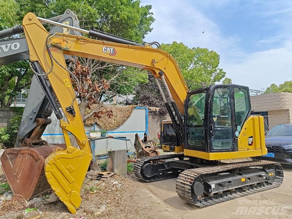 CAT 310 Excavadoras de cadenas