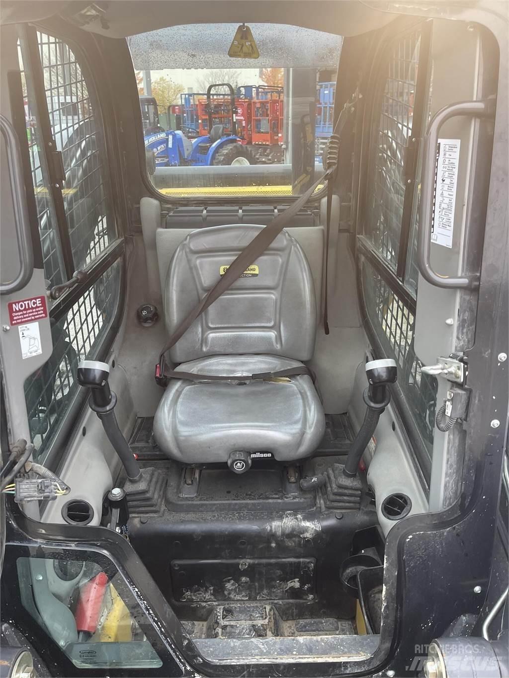 New Holland C237 Minicargadoras