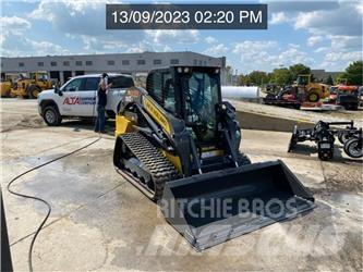 New Holland C345 Minicargadoras
