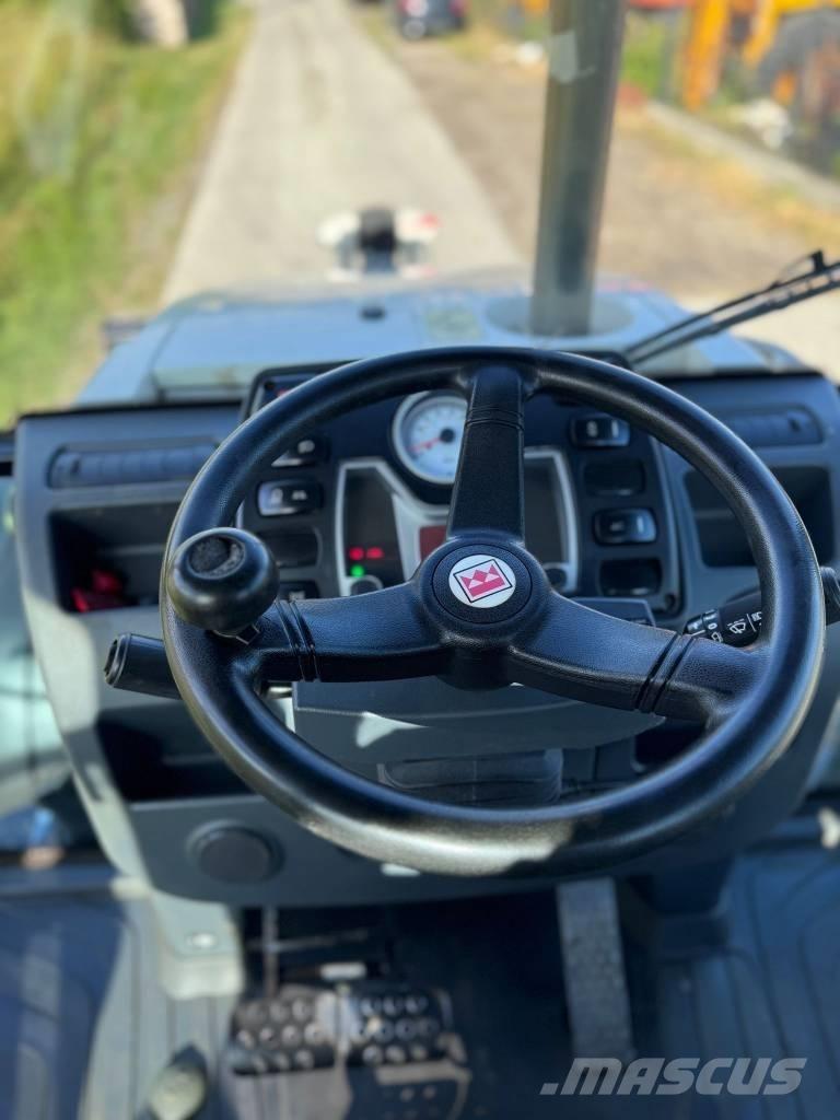 Terex TLB 890 PM Retrocargadoras