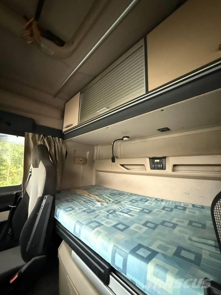 MAN TGX 32.580 Camiones portamaquinaria