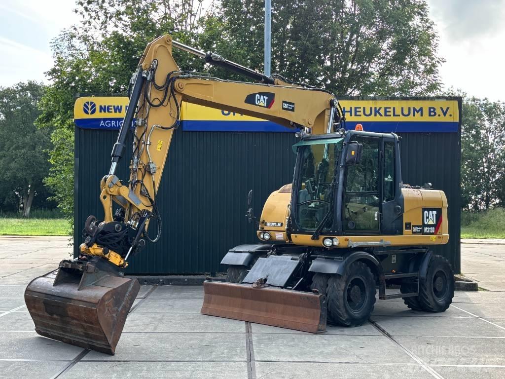 CAT M 313 D Excavadoras de ruedas