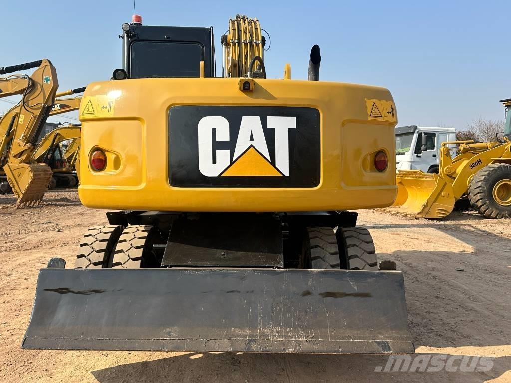 CAT M 320D Excavadoras de ruedas