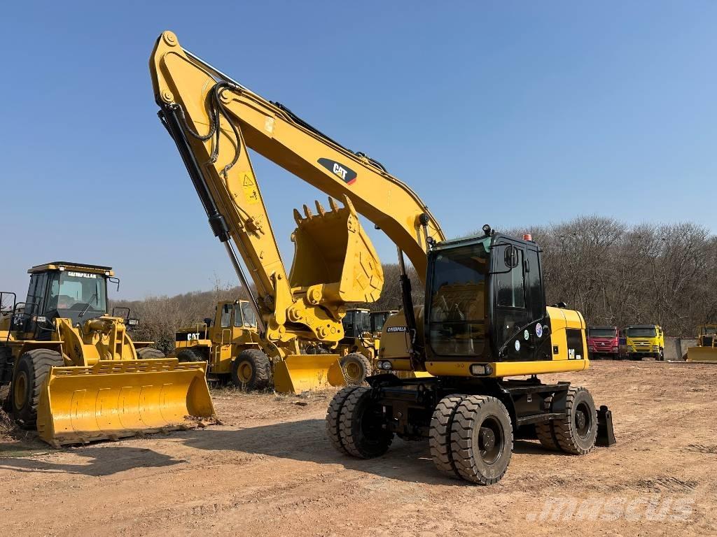 CAT M 320D Excavadoras de ruedas