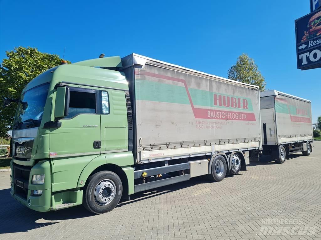 MAN 26.440  7.4 + 7.3 Camión con caja abierta