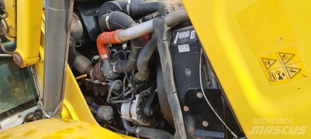 New Holland B 115 C Retrocargadoras