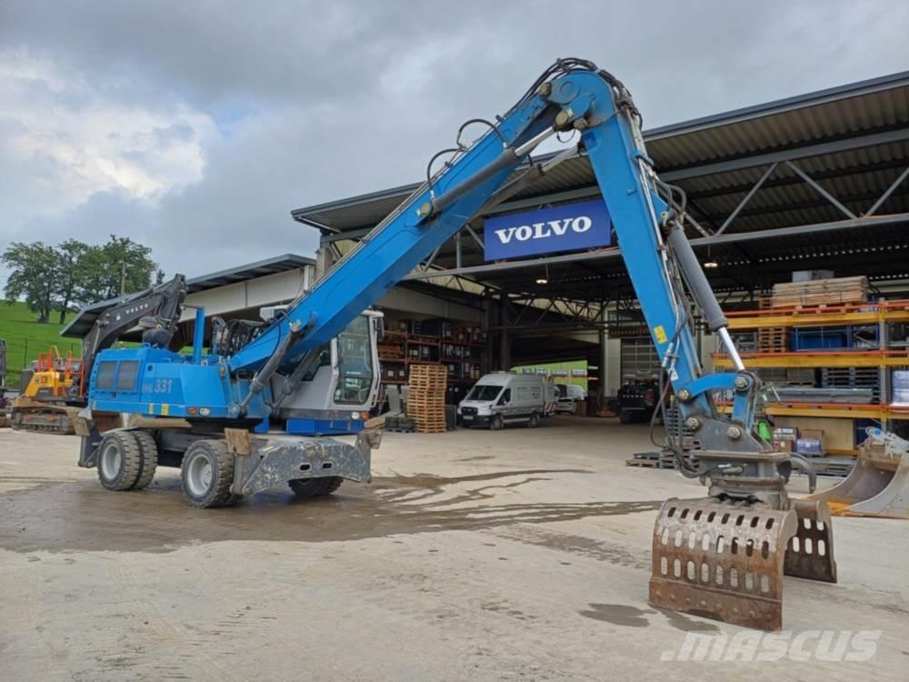 Fuchs MHL 331 Excavadoras de manutención