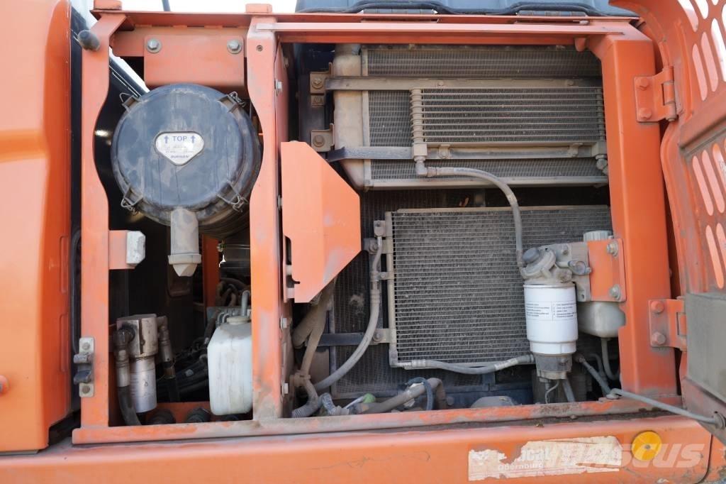 Doosan DX 140 W-3 Excavadoras de ruedas