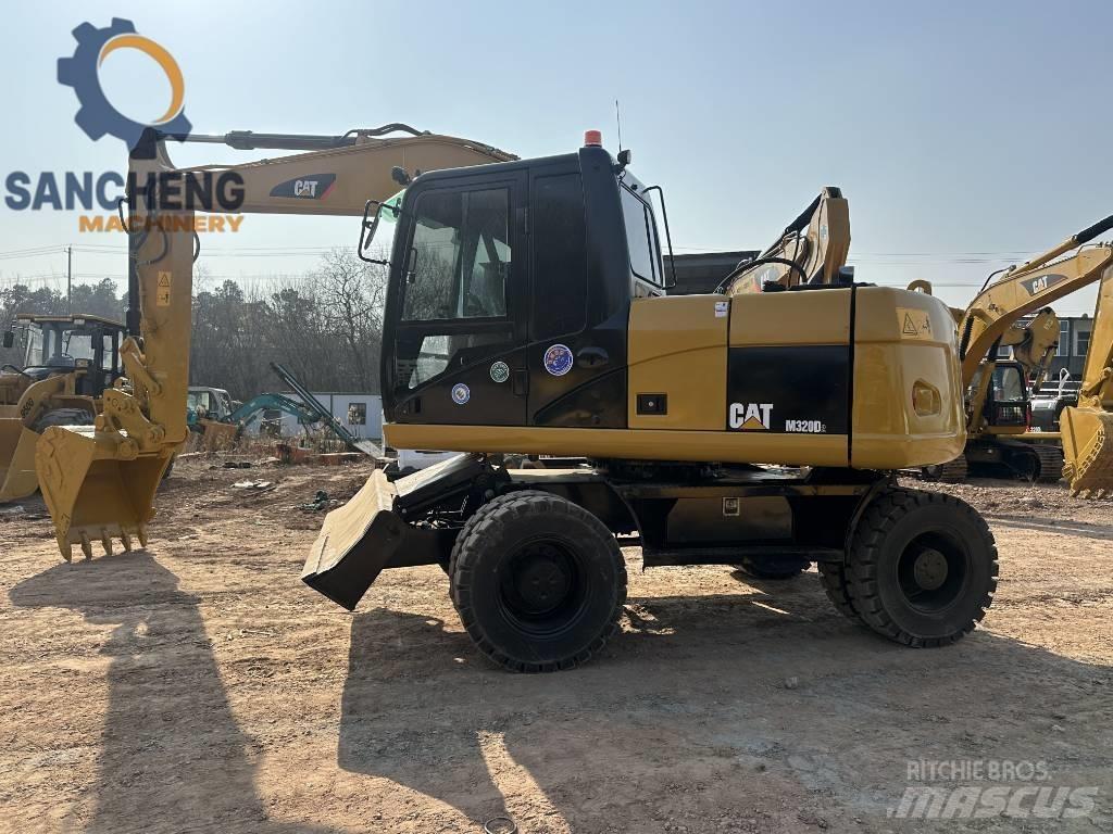 CAT M 320 D Excavadoras de ruedas