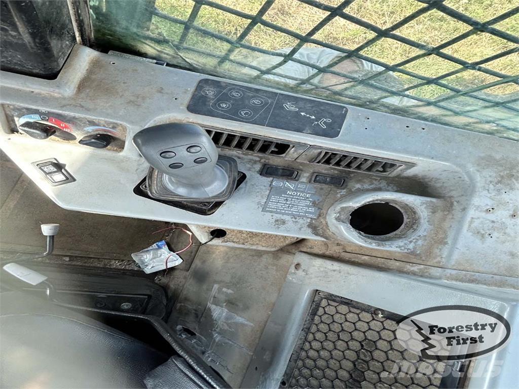 CAT 525B Arrastrador de troncos