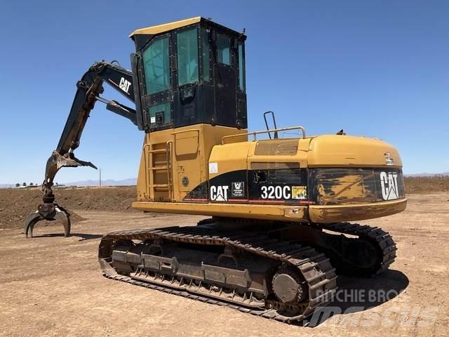 CAT 320C Cargadora forestal