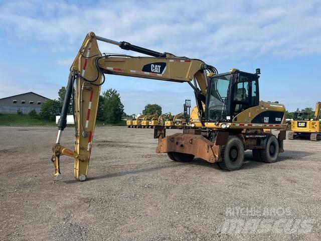 CAT M318D Excavadoras de ruedas