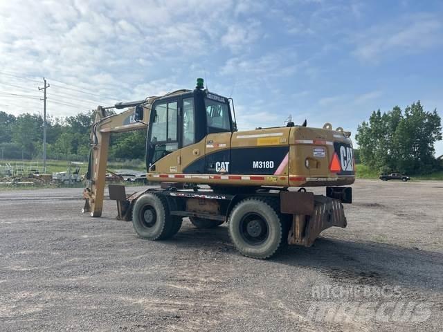 CAT M318D Excavadoras de ruedas