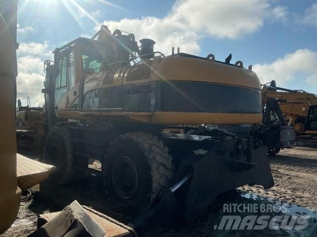 CAT M325CMH Cargadora forestal