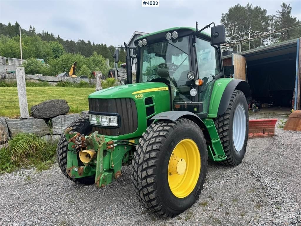 John Deere 6430 Tractores