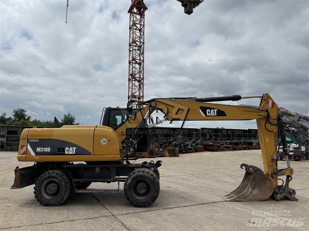 CAT M 318 D Excavadoras de ruedas