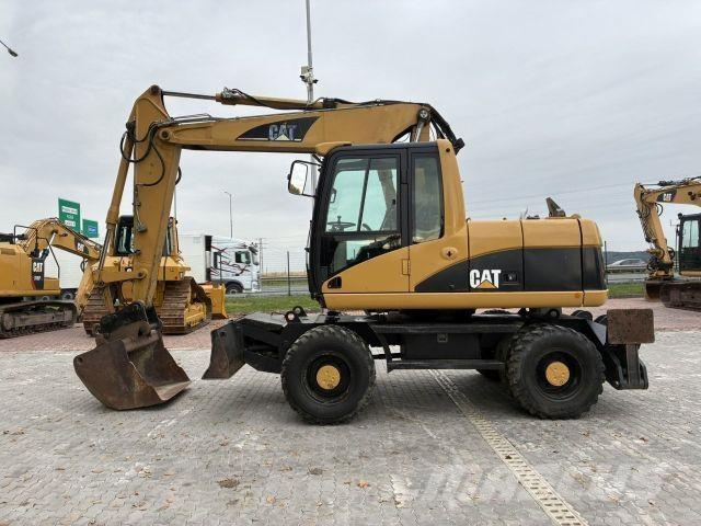 CAT M313C Construcción - Otros