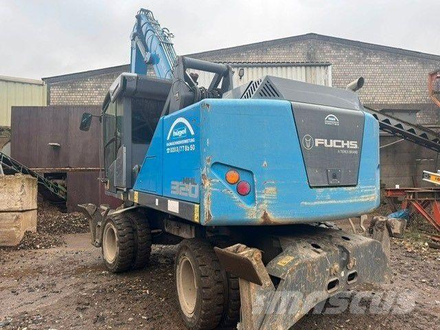 Fuchs MHL320 T4f Excavadoras de ruedas