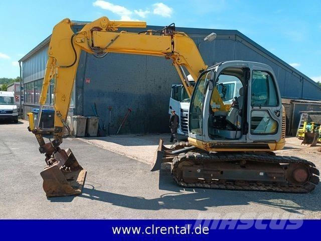 New Holland E70SR 4 Retrocargadoras
