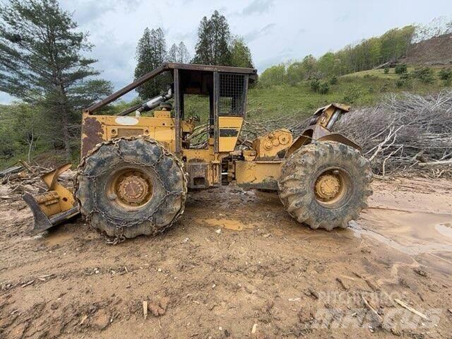 CAT 518 Arrastrador de troncos