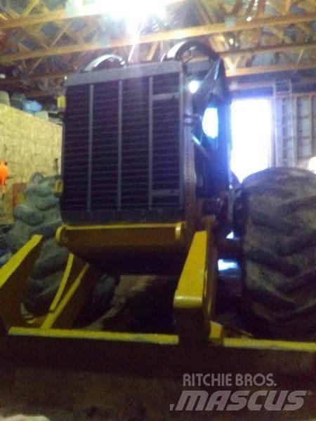 CAT 525C Arrastrador de troncos