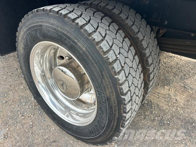 GMC C5500 Camiones portamaquinaria