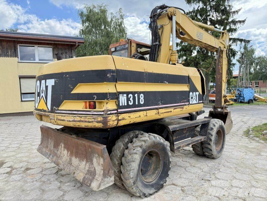 CAT M318 Excavadoras de ruedas