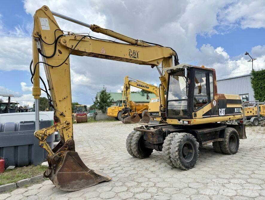 CAT M318 Excavadoras de ruedas