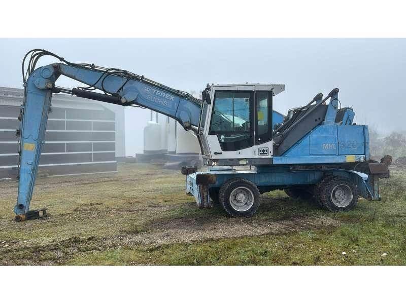 Fuchs MHL320 Excavadoras de manutención