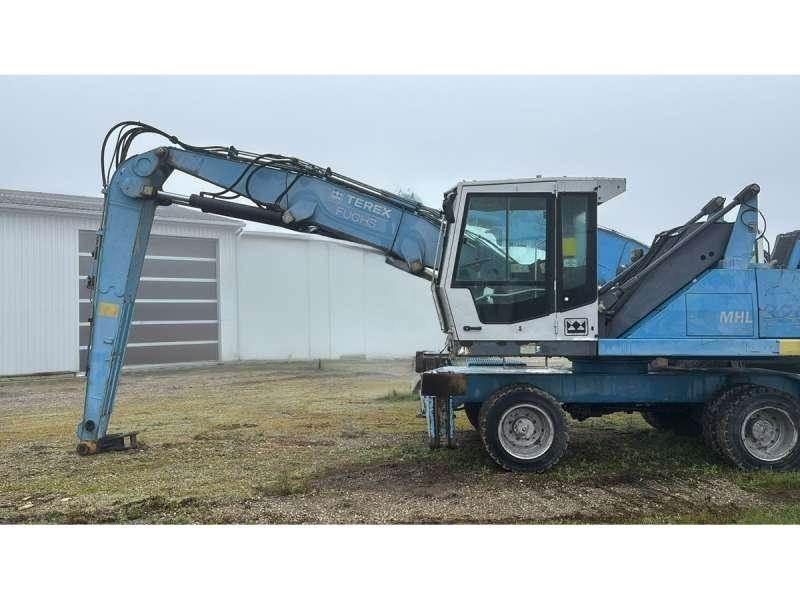 Fuchs MHL320 Excavadoras de manutención