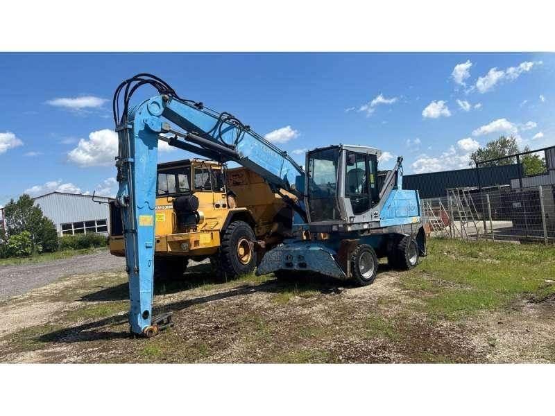 Fuchs MHL320 Excavadoras de manutención