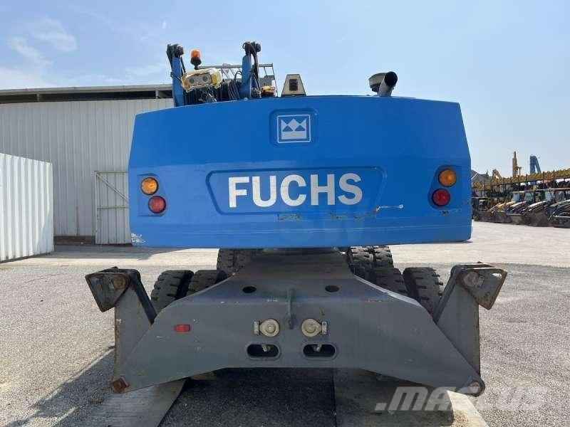 Fuchs MHL320 Excavadoras de manutención