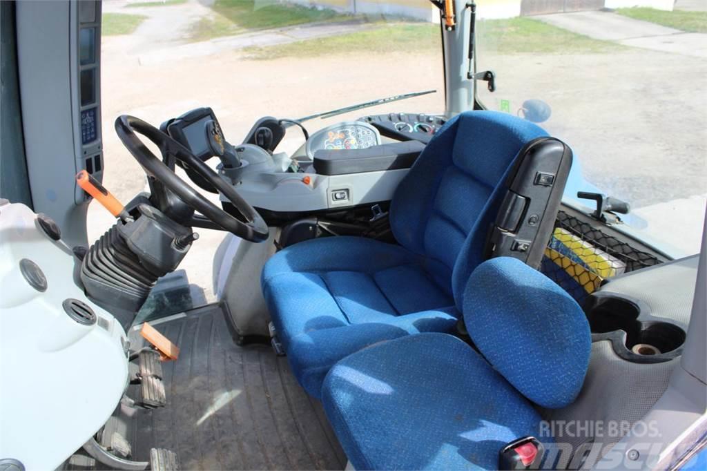 New Holland T8. 330 Tractores