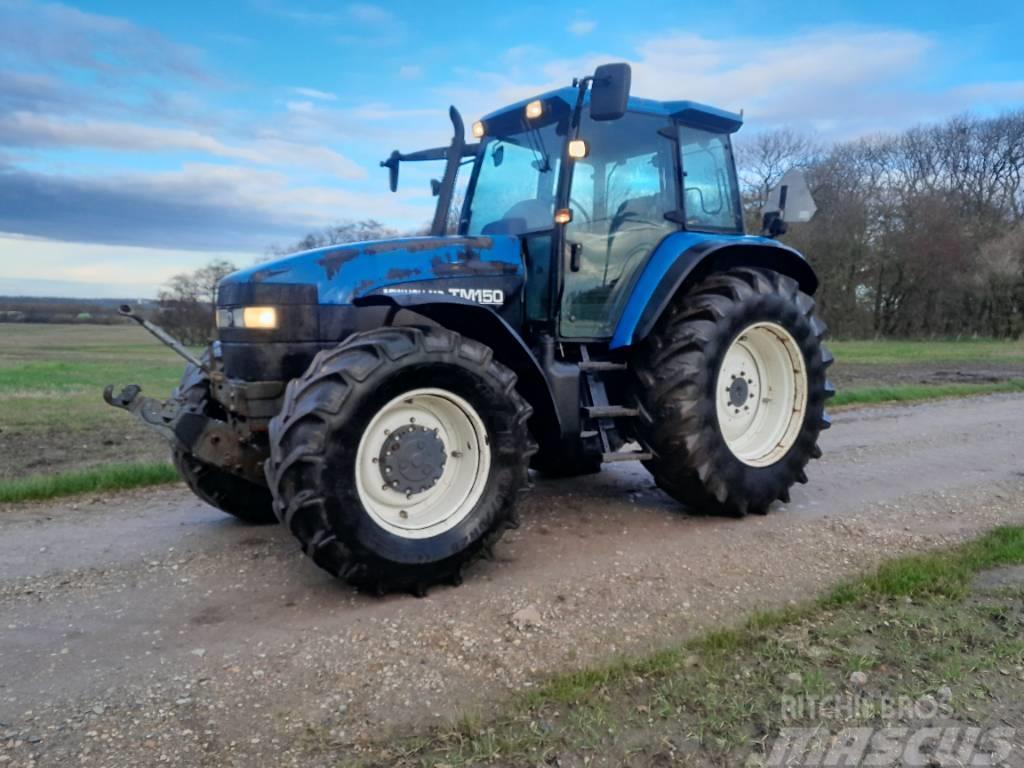 New Holland TM 150 med frontlift Tractores