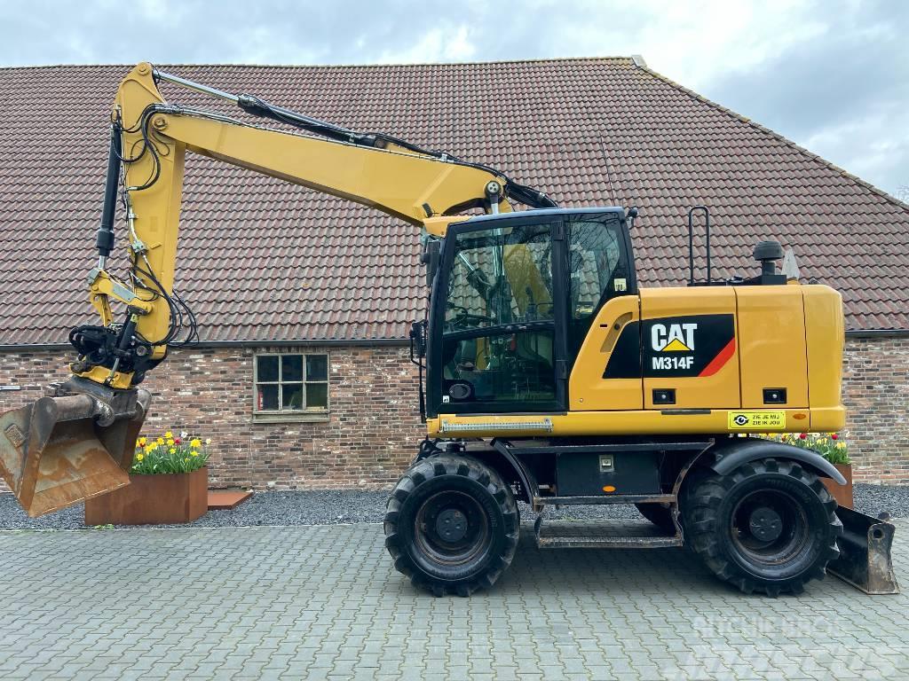CAT M314F inclusief Engcon EC214 Excavadoras de ruedas